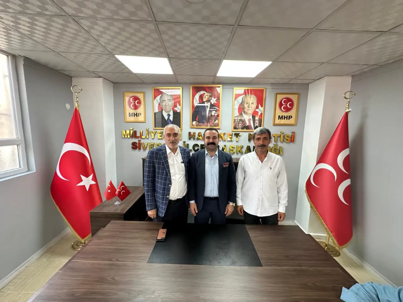Hasan İzol’dan MHP İlçe Başkanı Mahmut Gülel’e Hayırlı Olsun Ziyareti