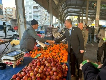 Karaköprü'de Seçim Hareketliliği: Aday İbrahim Bayram'dan Pazar Esnafına Ziyaret